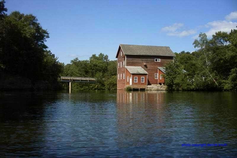 The Dells Mill Museum and County V Bridge fron the Dells Pond