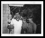 Tom holds his kids and his wife Peggy July 1974