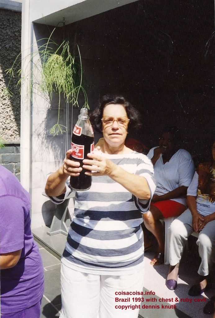 Vicentina offering coke to guests