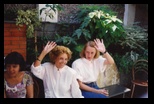 Heloisa with Gabriella and Maria Lena waving to the camera