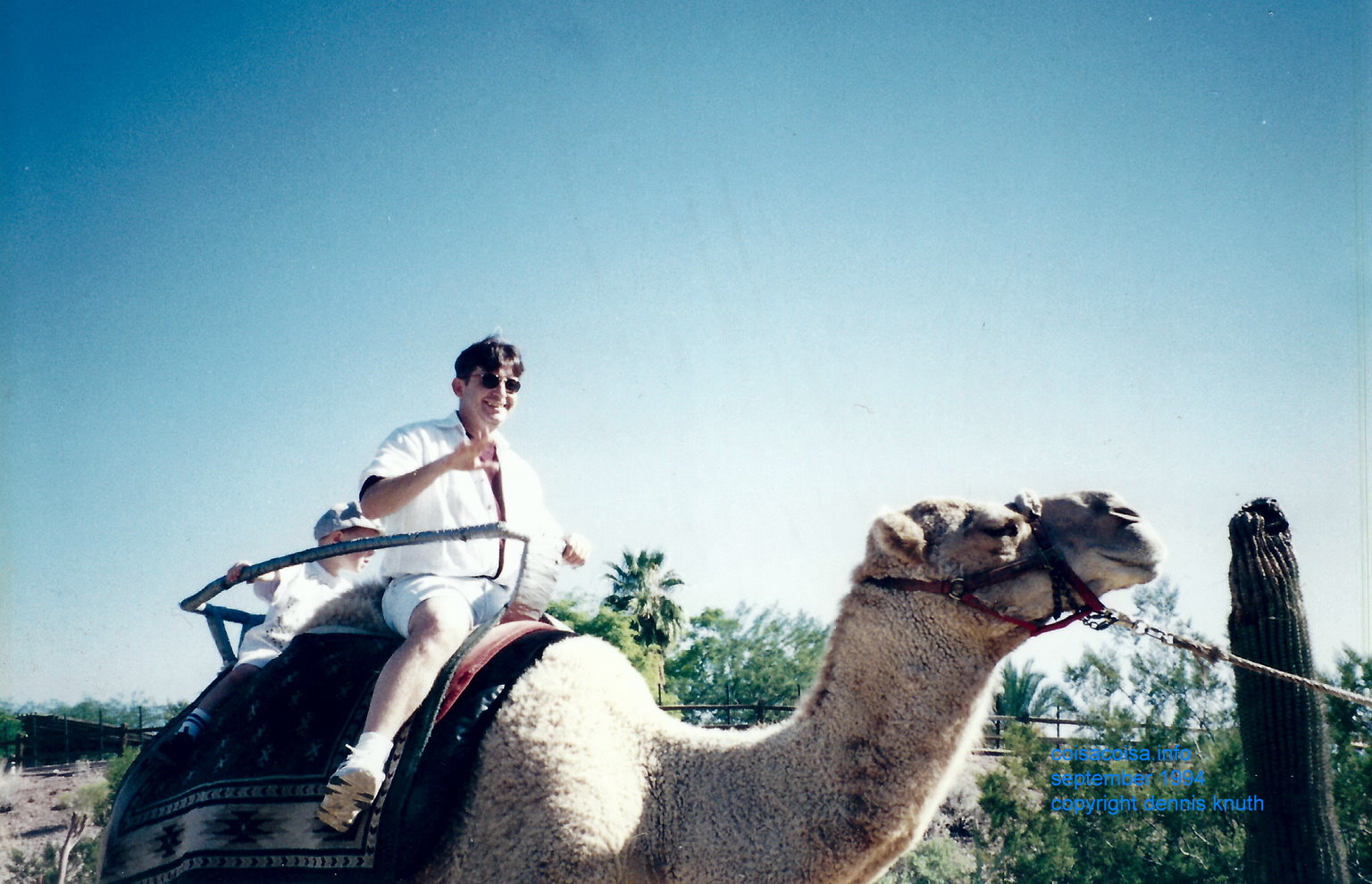 Sergio takes a ride on a camel at the Phoenix Zoo