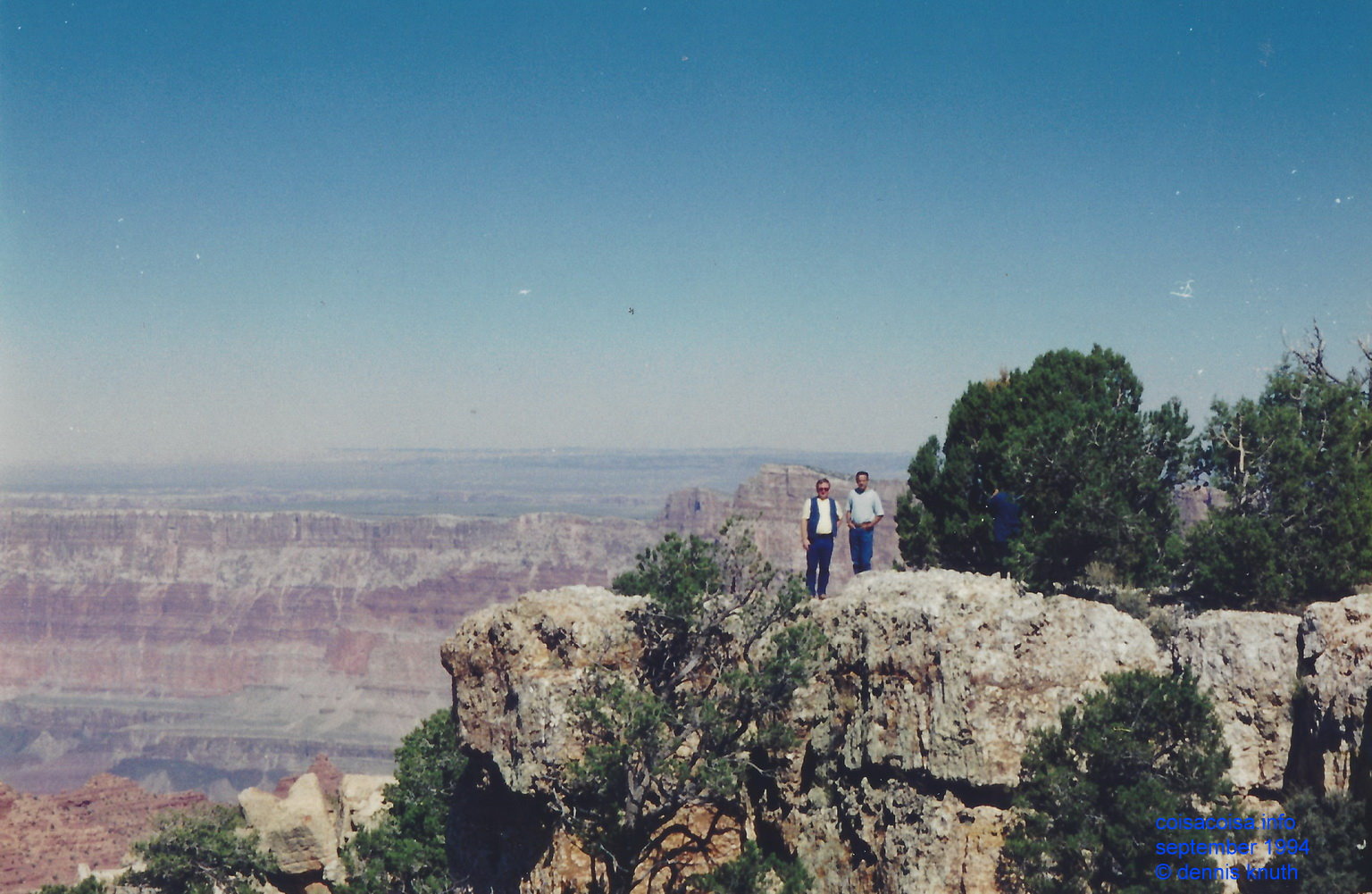 Dennis and Tom out on a precipice at the Grand Canyon
