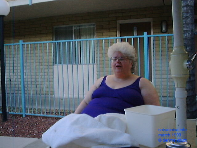 Gloria by the pool, towel and ice bucket