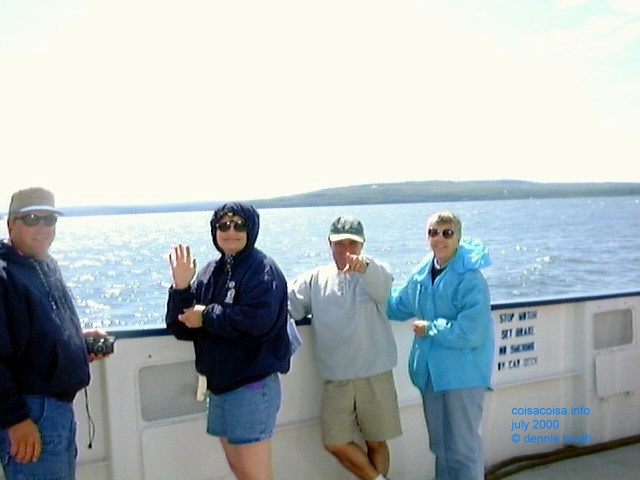 The family waves on the ferry 