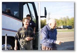 Bob Ives and Carl Ives exit the bus for the intermediate stop