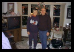 Dennis and Emogene in 2002 in front of the tree