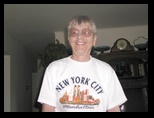 A big smile on Emogene in her New York t-shirt
