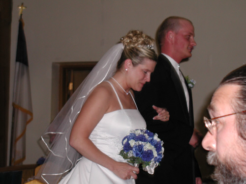 The newly weds in the wedding recessional