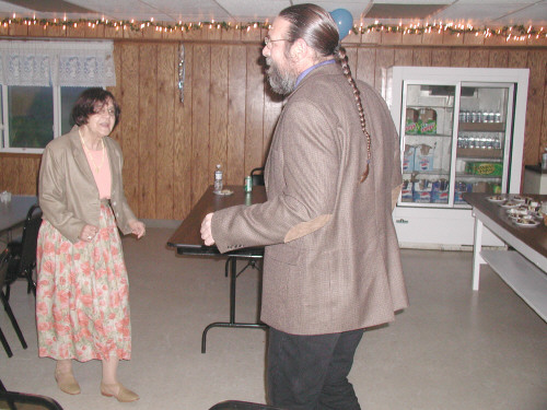 Russell dances with his mother