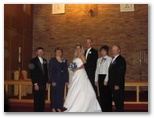 The bride and groom with their Parents in the 2004 wedding