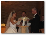 Nathan and Kelly light the candle of love