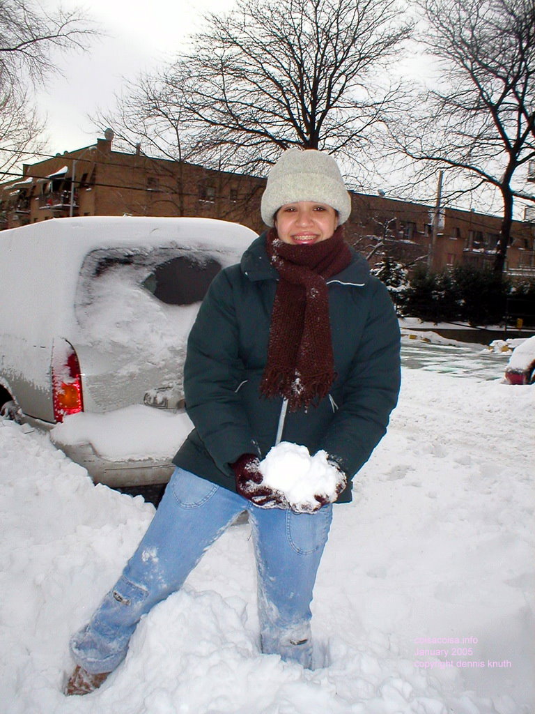 Thaissa makes a snow ball