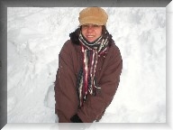 Heloisa snuggles in the snow