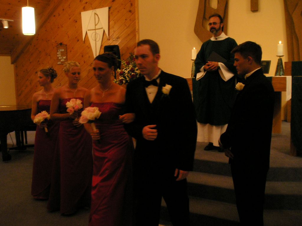 Matt and his bridesmaid exit the altar