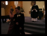 Bridesmaid and Mike exit the church