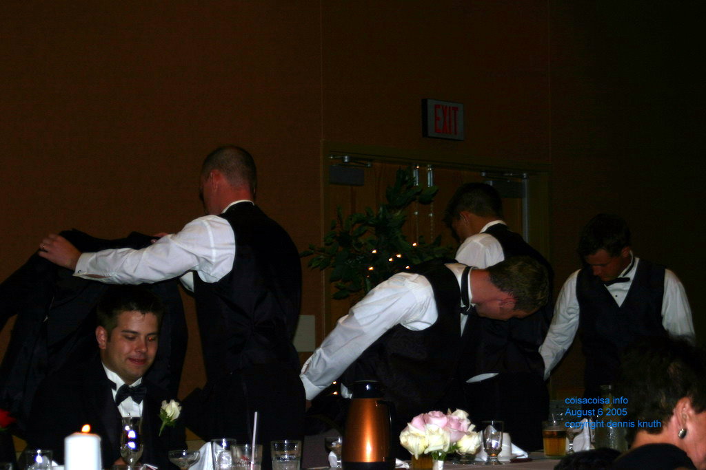 Groomsmen being seated at Justin and Julia's wedding