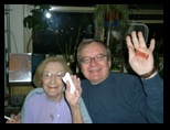 Dennis Knuth and Olga wave to the camera