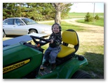 Jared Drives a John Deere Mower at 9 Months