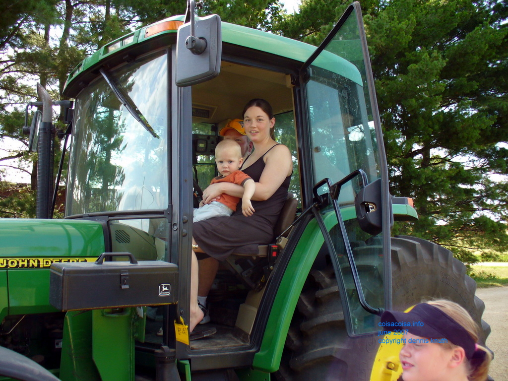 Jared and Julia in the tractor cab