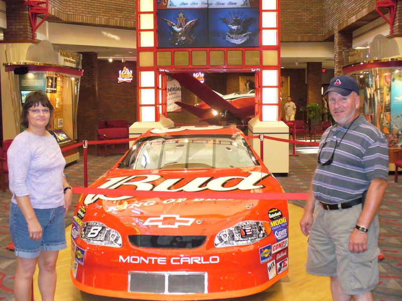 Sherri and Gary with the Budweiser NASCAR