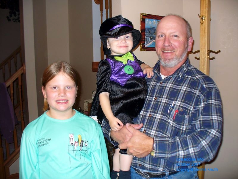 Grandpa Gary with his grandchildren at Halloween
