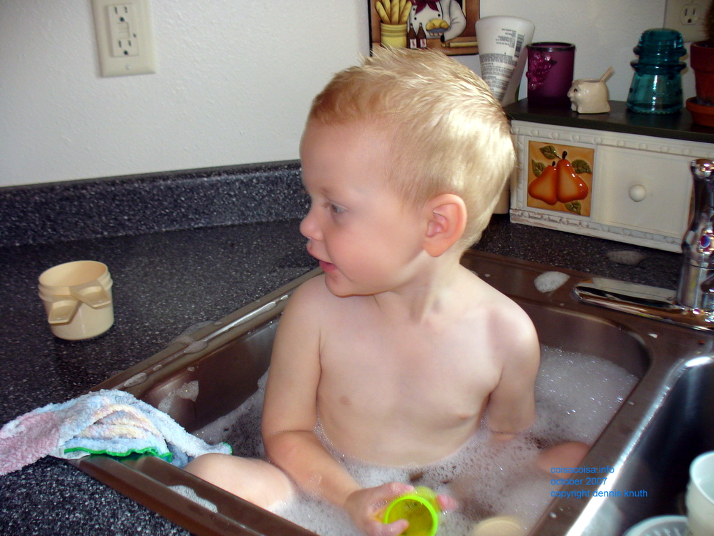 Jared bathes in the Kitchen Sink