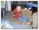 Jared playing with a box