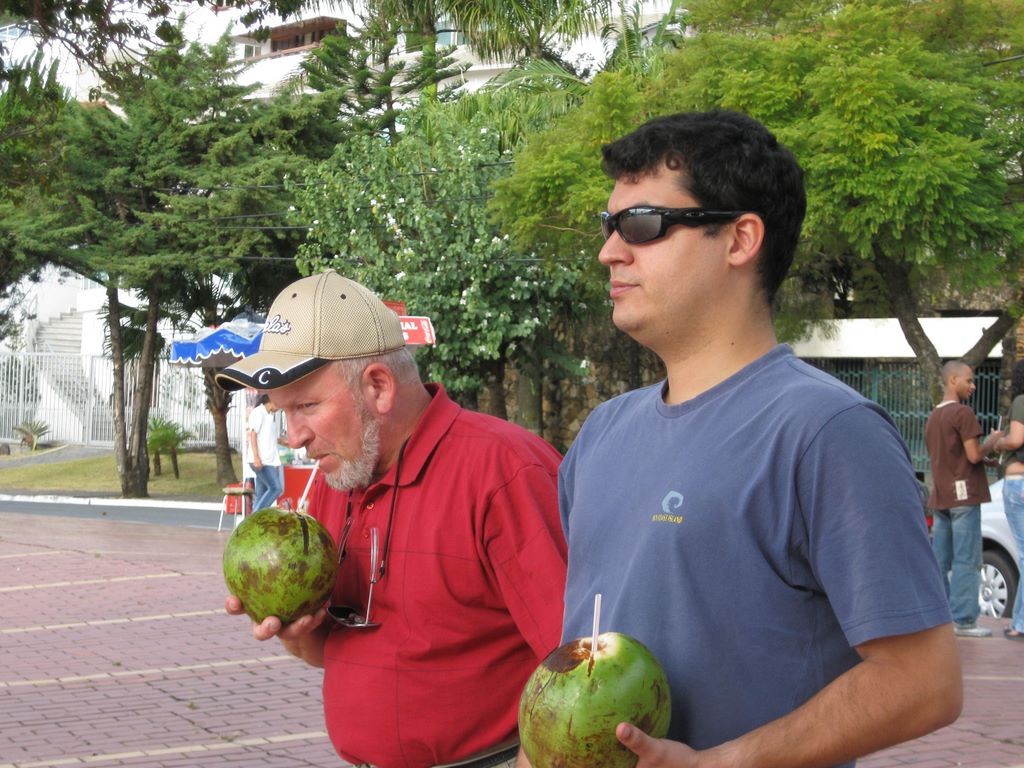 Eduardo and Gary sucking coconut