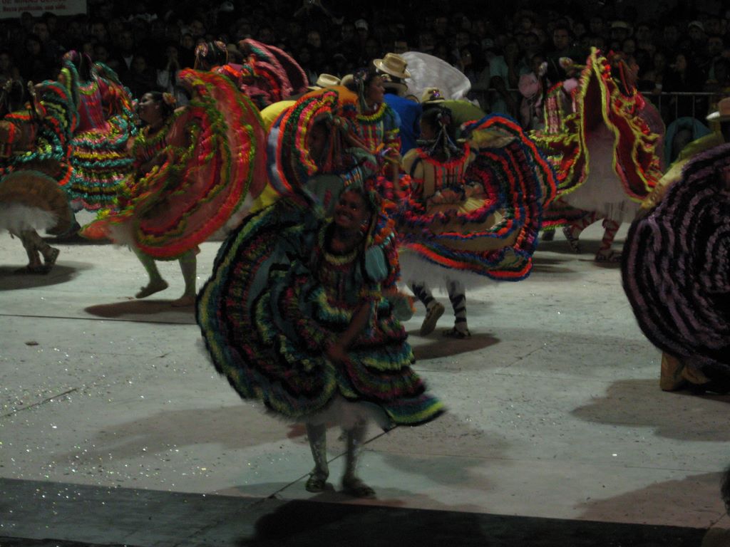 Brazilian folk dancers twirl in their vivid skirts