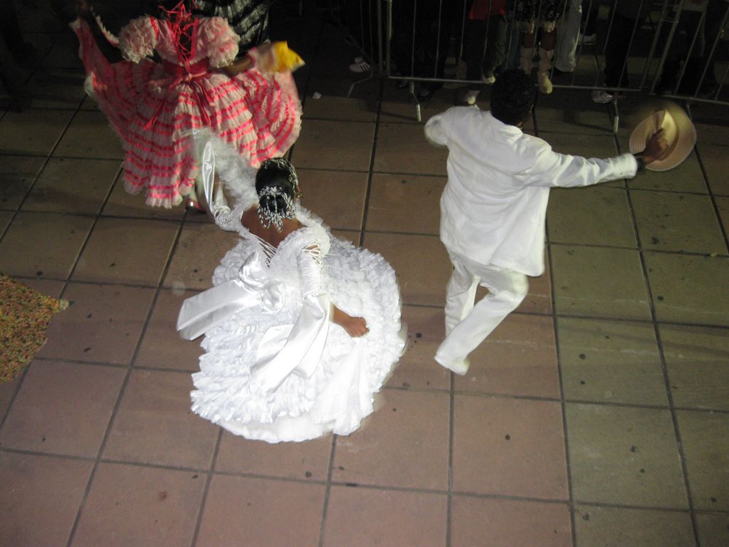 Brazilian groom and bride folk dancers in Belo Horizonte dressed in white