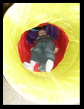 Jared plays in his tub tunnel