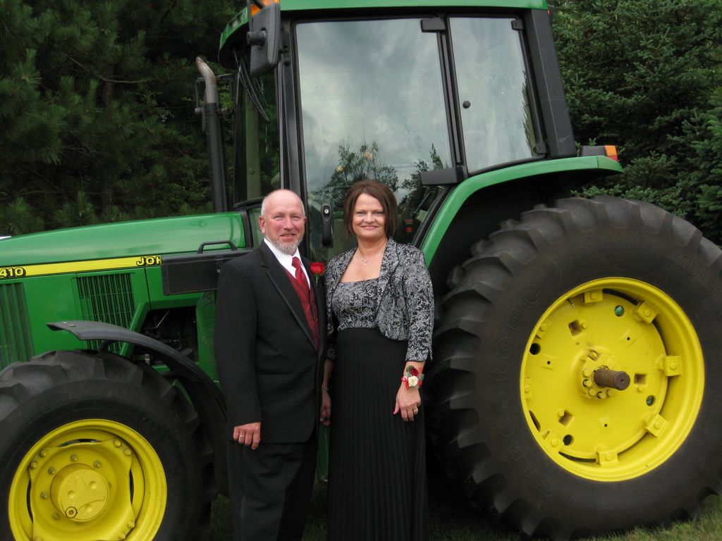 The tractor is owned by the Brides Parents