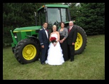 Parents Newlyweds and the tractor