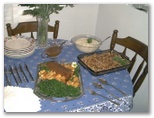 The Dinner Table with food by Helton