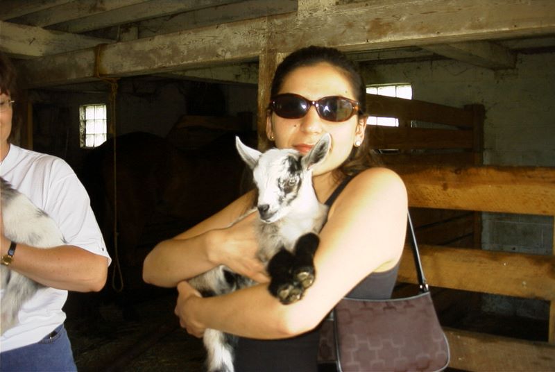 Silesia Patricia Oliviera Depaulo and a goat