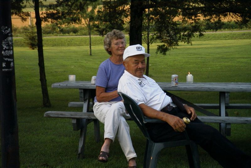 Rose and Don Grams relax on the picnic table