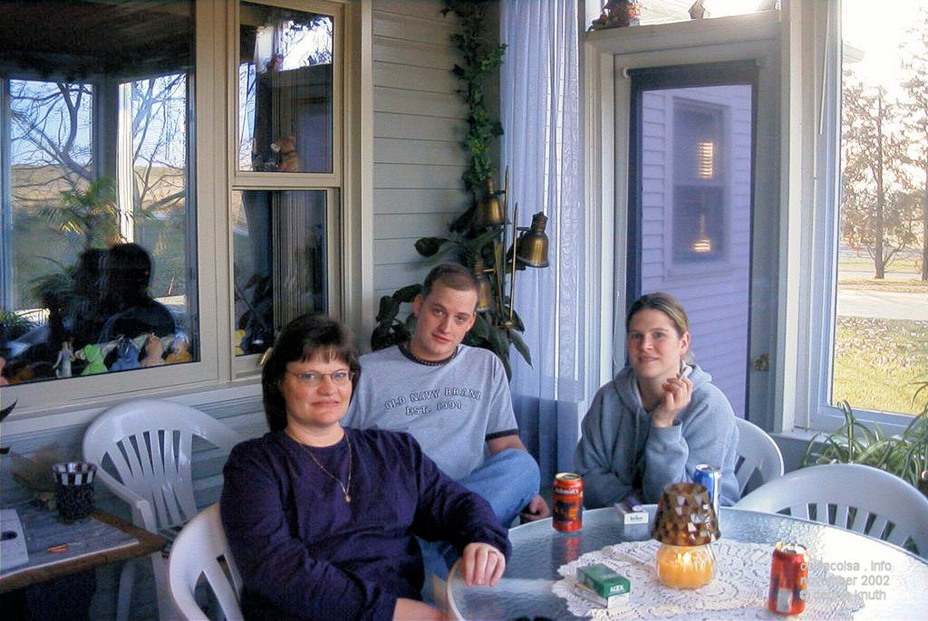 Sherri, Nate, and Kelly on the porch