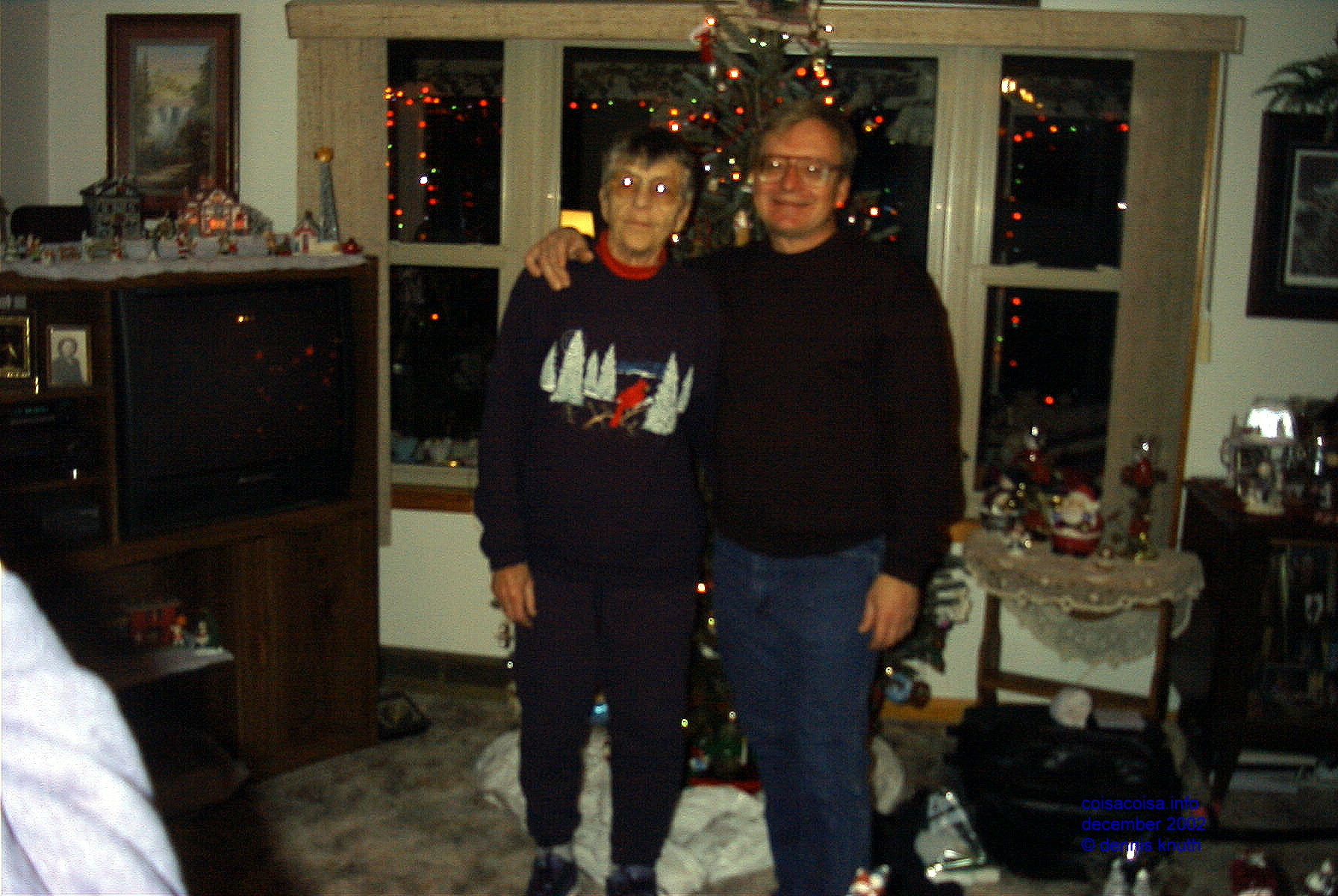 Dennis and Emogene in 2002 in front of the tree