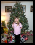 Kelsey by her Christmas Tree