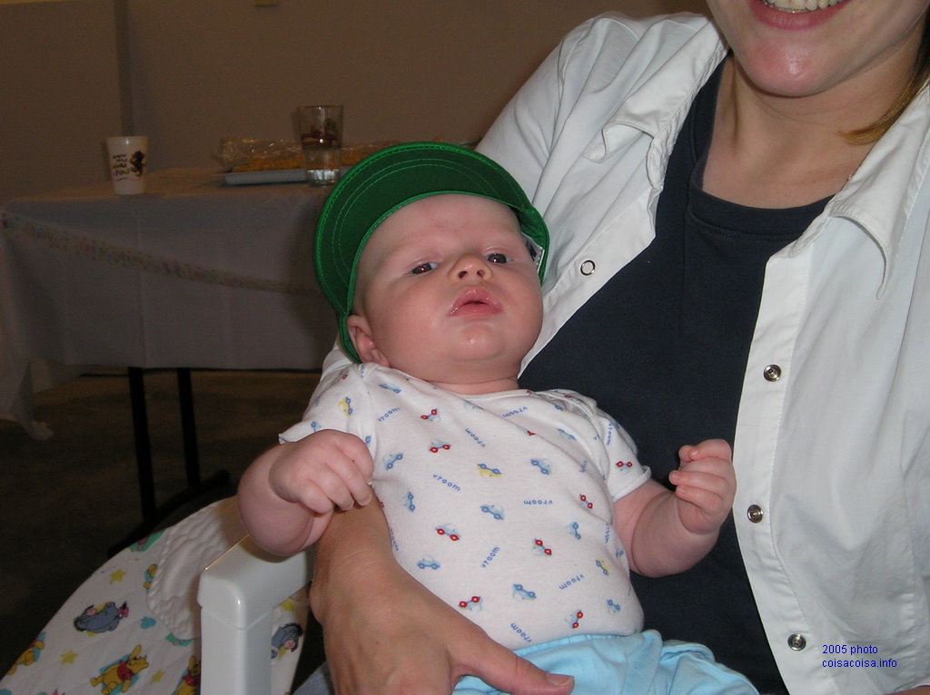 Jared in a green cap at 3 months