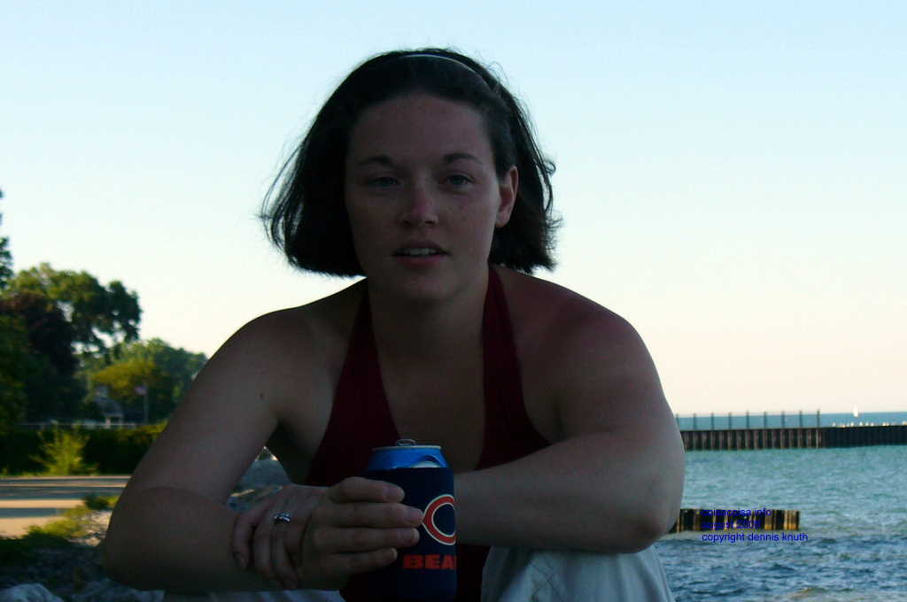 Julia sips a beer