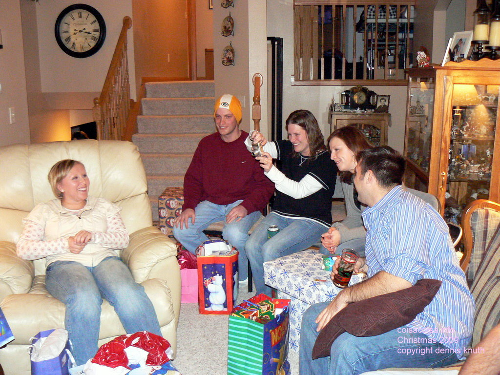Moore and Saxe familly laughing at Christmas