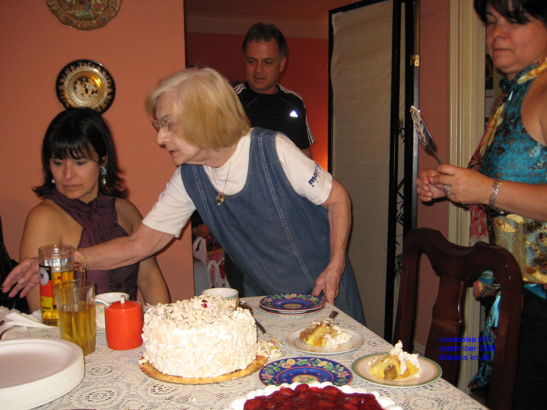 Olga adjusts the table at Helton's Birthday Party