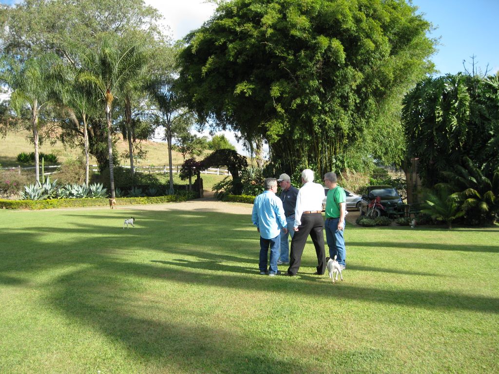 Visitors chat on the well groom property