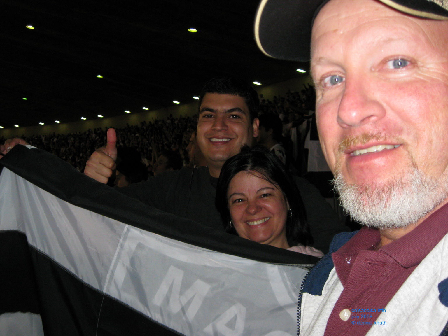 Gary Saxe of Durand with Helenice and Dudu at a Brazil Futbol game