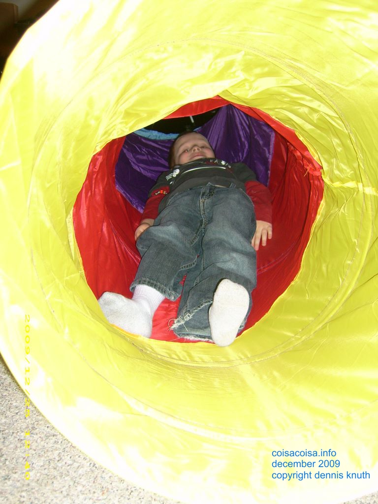 Jared crawls in the tunnel on Christmas
