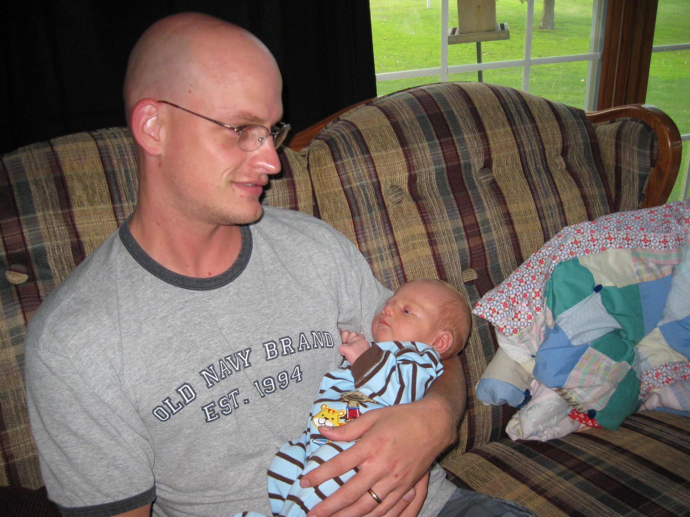 Uncle Nate holds new nephew Colin
