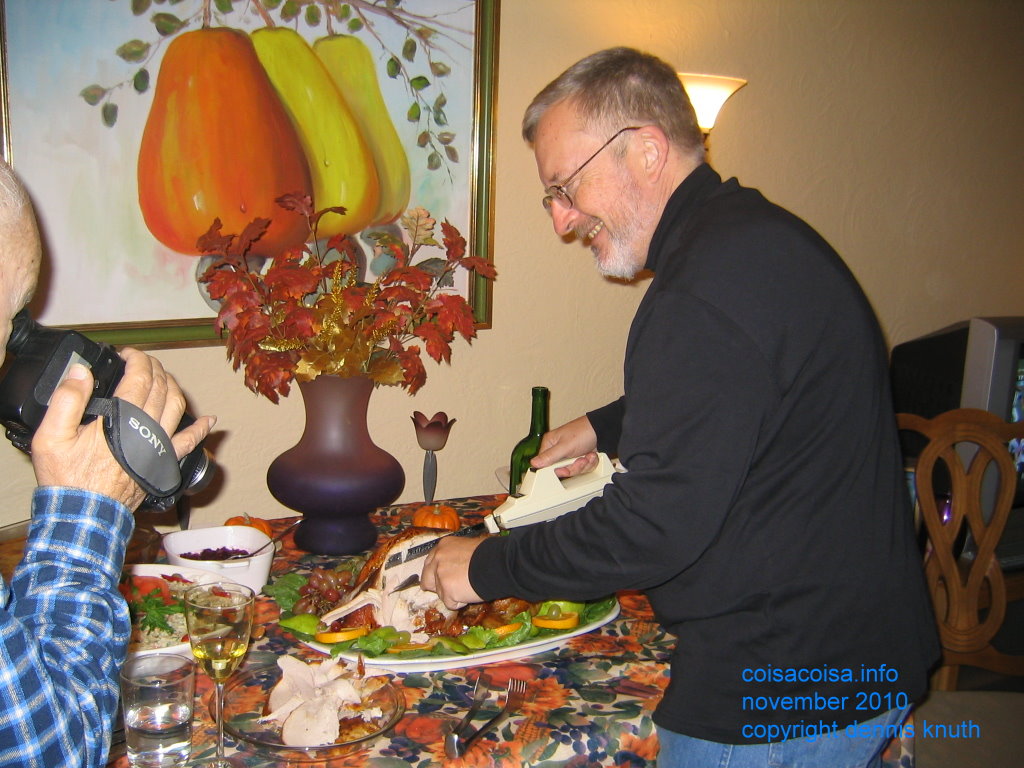 Dennis Knuth carves the Thanksgiving Turkey