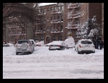 Cars askew on snowy streets block plowing and emergency vehicles
