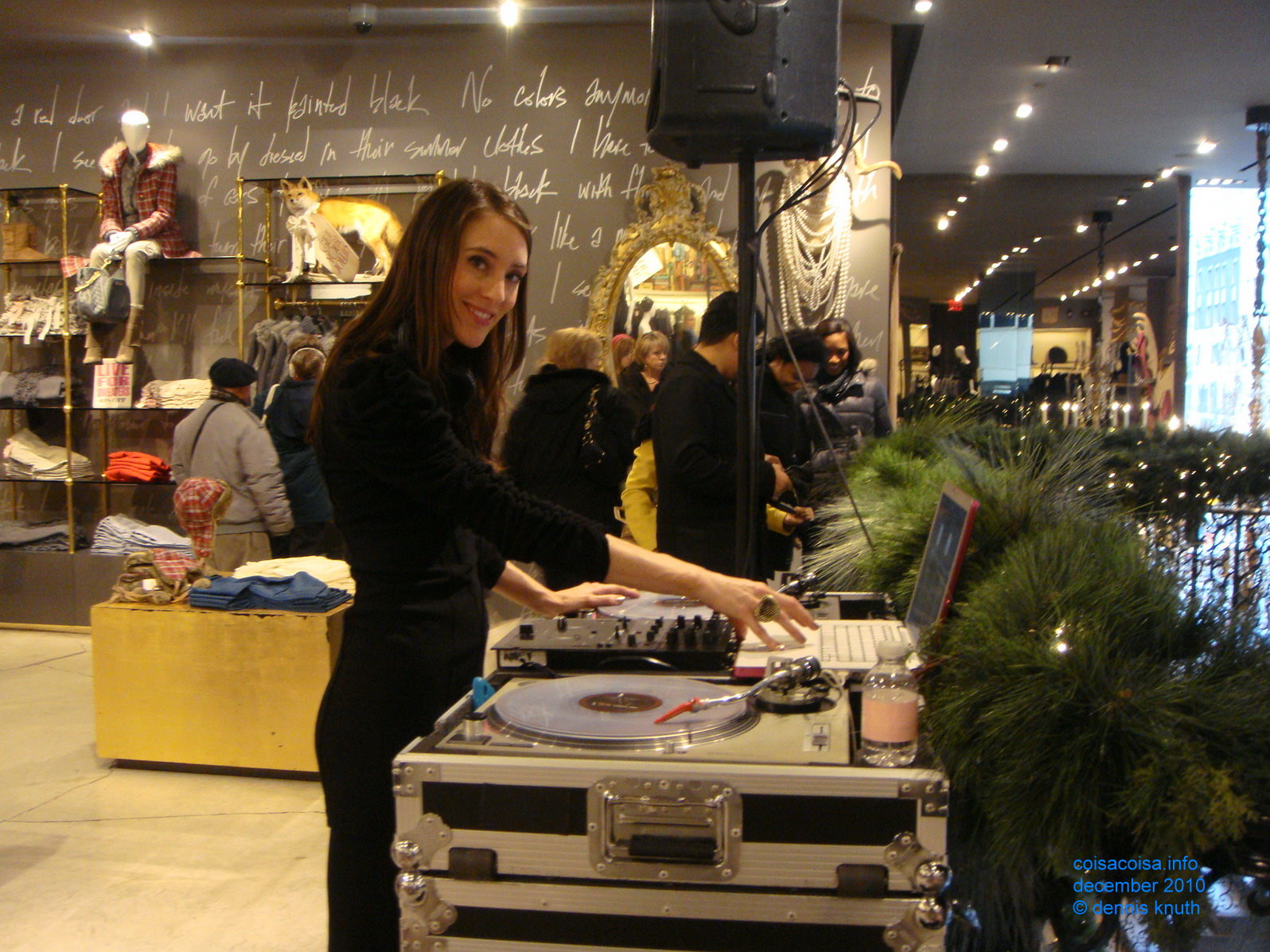 DJ spinning Christmas Songs for Shoppers in NY